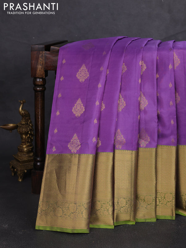 Kanchipuram silk saree lavender and light green with allover zari woven buttas and long zari woven border