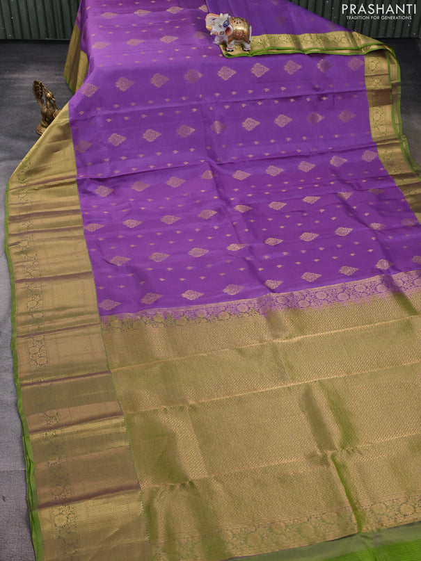 Kanchipuram silk saree lavender and light green with allover zari woven buttas and long zari woven border