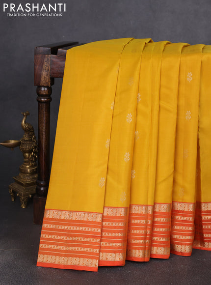 Kanchipuram silk saree yellow and orange with allover zari woven buttas and zari woven border