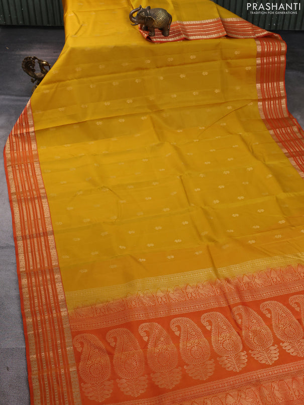 Kanchipuram silk saree yellow and orange with allover zari woven buttas and zari woven border
