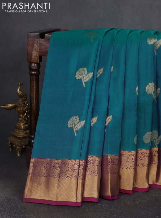 Kanchipuram silk saree peacock green and wine shade with allover zari woven buttas and zari woven border