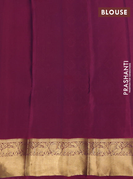 Kanchipuram silk saree peacock green and wine shade with allover zari woven buttas and zari woven border