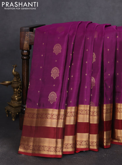 Kanchipuram silk saree wine shade and maroon with allover zari woven buttas and rettapet zari woven border