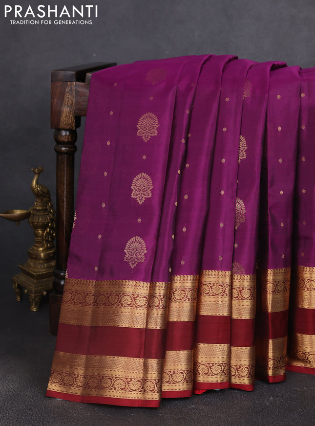 Kanchipuram silk saree wine shade and maroon with allover zari woven buttas and rettapet zari woven border