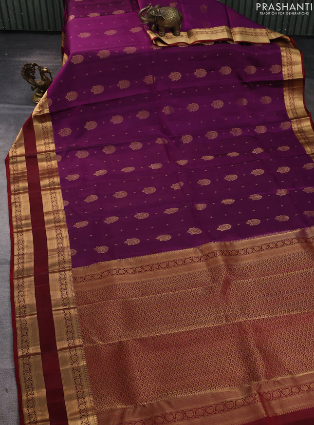 Kanchipuram silk saree wine shade and maroon with allover zari woven buttas and rettapet zari woven border