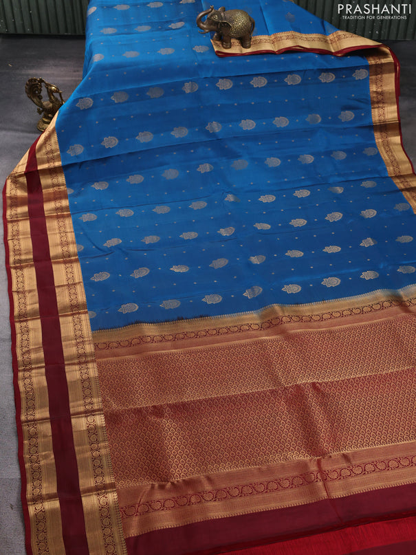 Kanchipuram silk saree peacock blue and maroon with allover zari woven buttas and zari woven border