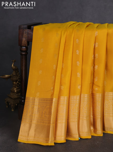 Kanchipuram silk saree yellow with allover zari woven buttas and long zari woven border