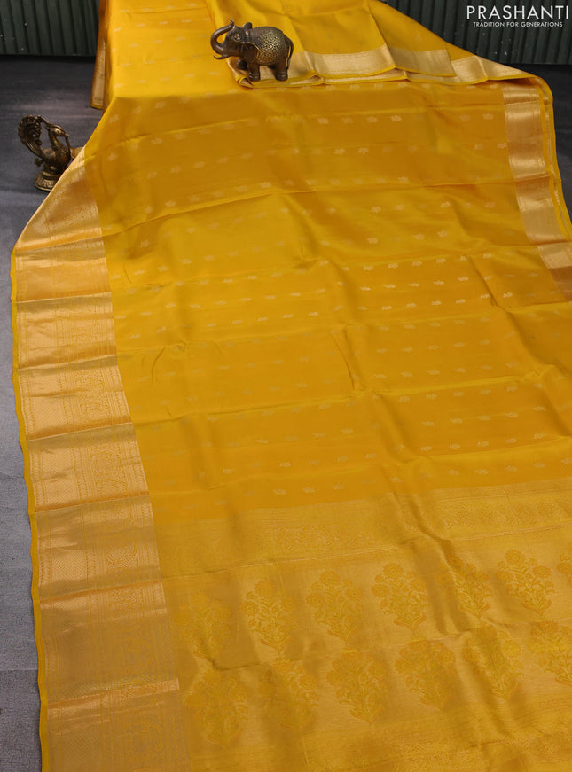 Kanchipuram silk saree yellow with allover zari woven buttas and long zari woven border
