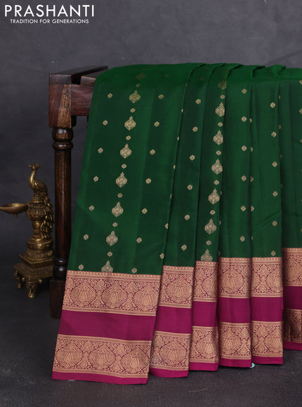 Kanchipuram silk saree green and purple with allover zari woven buttas and rettapet zari woven border