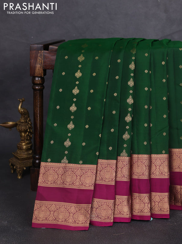 Kanchipuram silk saree green and purple with allover zari woven buttas and rettapet zari woven border