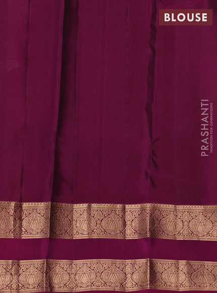 Kanchipuram silk saree green and purple with allover zari woven buttas and rettapet zari woven border