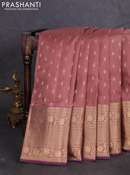 Kanchipuram silk saree rosy brown and purple with allover zari woven buttas and long zari woven border
