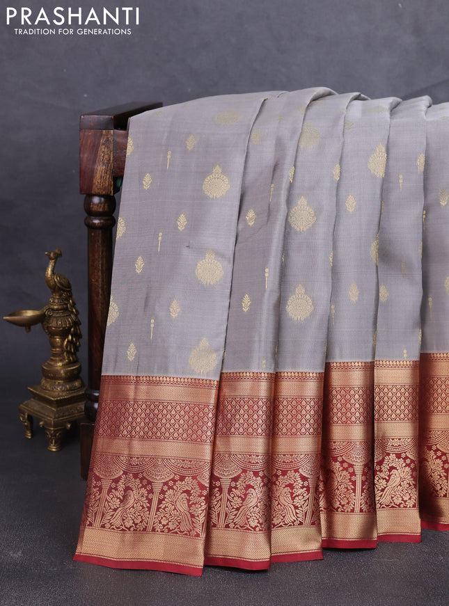 Kanchipuram silk saree grey and maroon with allover zari woven buttas and long zari woven border