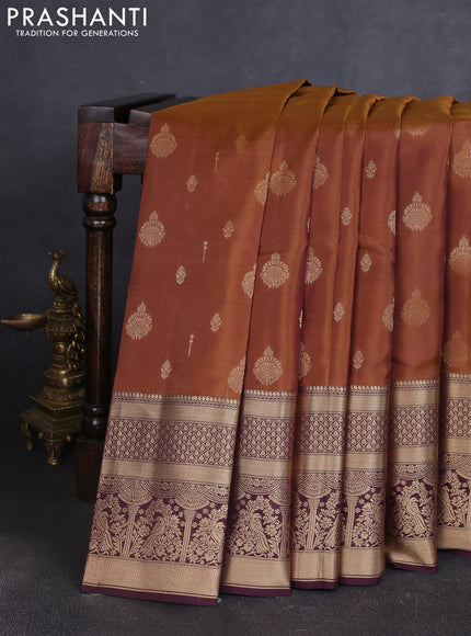 Kanchipuram silk saree dark mustard and coffee brown with allover zari woven buttas and long zari woven border