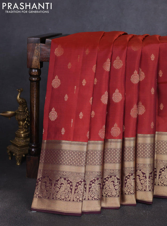 Kanchipuram silk saree rust shade and coffee brown with allover zari woven buttas and long zari woven border