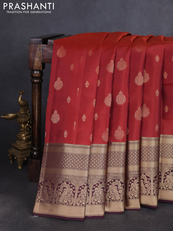 Kanchipuram silk saree rust shade and coffee brown with allover zari woven buttas and long zari woven border