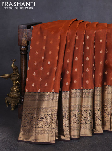 Kanchipuram silk saree rustic orange and coffee brown with allover zari woven buttas and long zari woven border