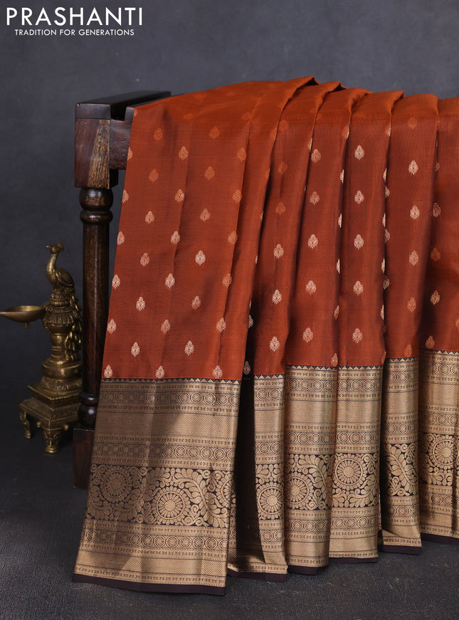 Kanchipuram silk saree rustic orange and coffee brown with allover zari woven buttas and long zari woven border