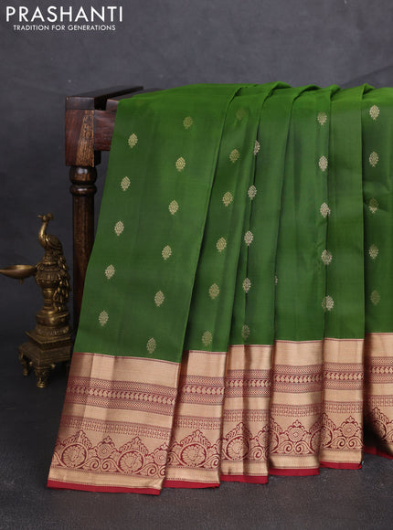 Kanchipuram silk saree green  and maroon with allover zari woven buttas and long zari woven border