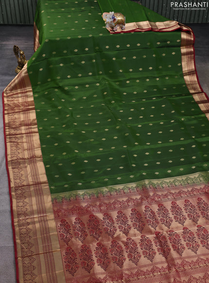 Kanchipuram silk saree green  and maroon with allover zari woven buttas and long zari woven border