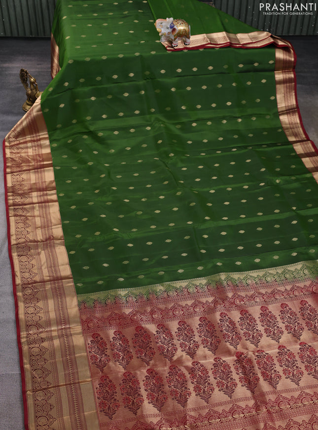 Kanchipuram silk saree green  and maroon with allover zari woven buttas and long zari woven border