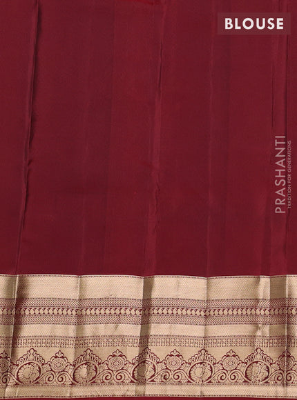 Kanchipuram silk saree green  and maroon with allover zari woven buttas and long zari woven border