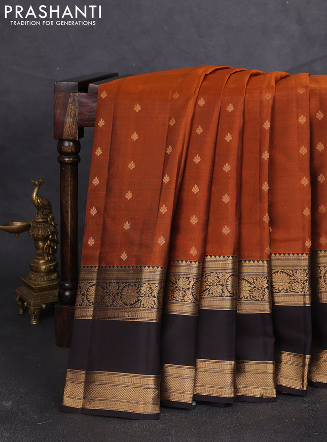 Kanchipuram silk saree rustic orange and black with allover zari woven buttas and long rettapet zari woven border