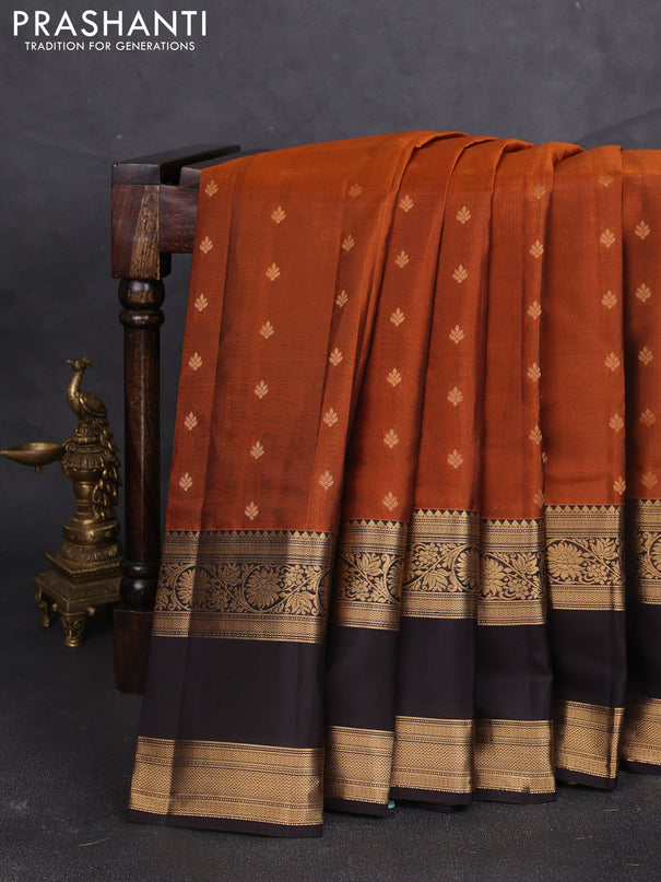 Kanchipuram silk saree rustic orange and black with allover zari woven buttas and long rettapet zari woven border