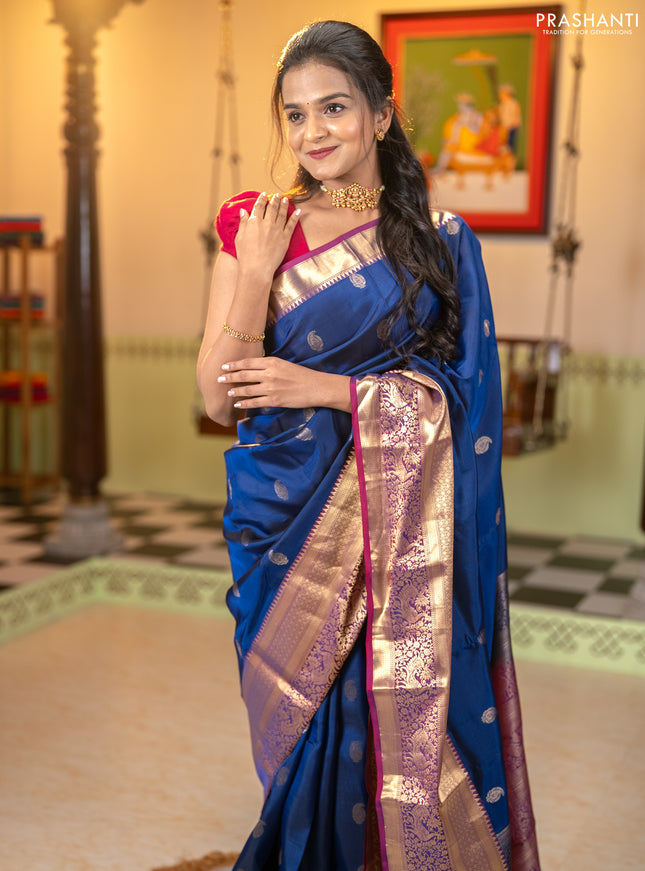 Kanchipuram silk saree navy blue and wine shade with allover paisley zari woven buttas and long zari woven border