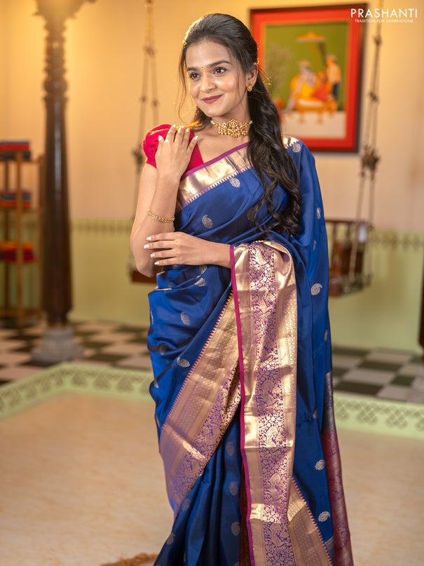 Kanchipuram silk saree navy blue and wine shade with allover paisley zari woven buttas and long zari woven border
