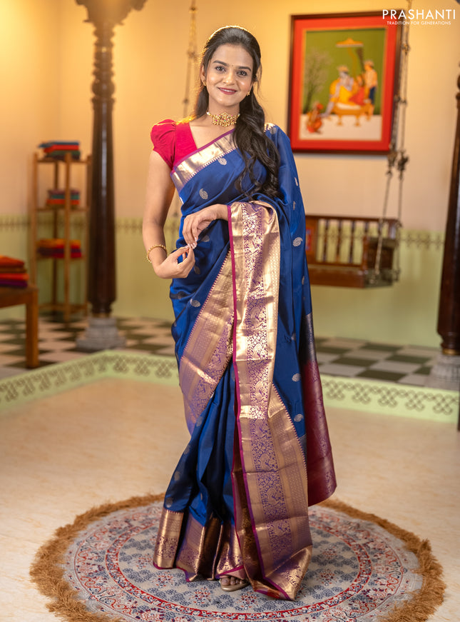 Kanchipuram silk saree navy blue and wine shade with allover paisley zari woven buttas and long zari woven border
