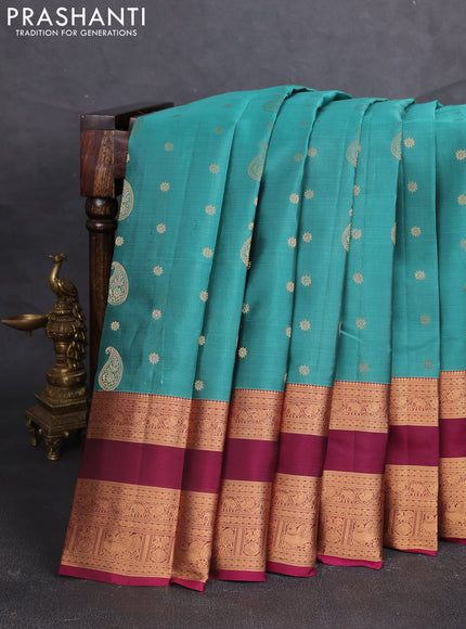 Kanchipuram silk saree green shade and wine shade with allover zari woven buttas and long rettapet zari woven border