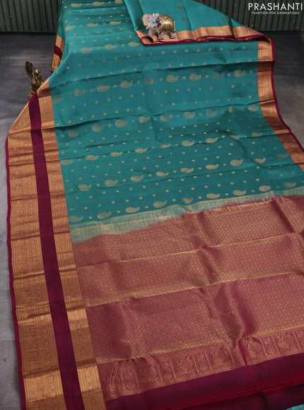 Kanchipuram silk saree green shade and wine shade with allover zari woven buttas and long rettapet zari woven border