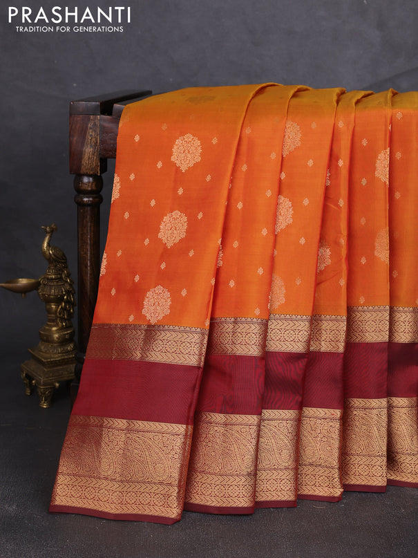 Kanchipuram silk saree sunset orange and deep maroon with allover zari woven buttas and long rettapet zari woven border