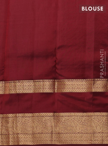 Kanchipuram silk saree sunset orange and deep maroon with allover zari woven buttas and long rettapet zari woven border