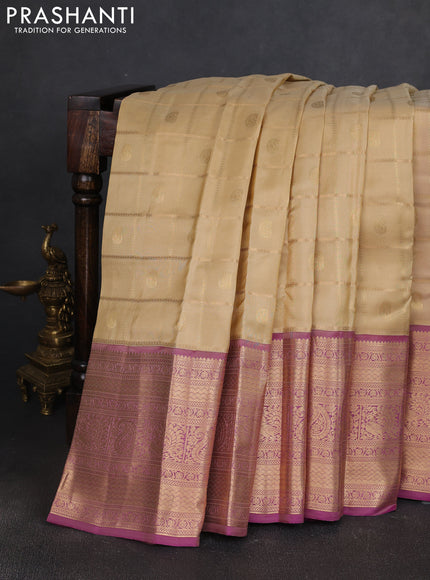 Kanchipuram silk saree cream and dual shade of pink with allover zari checks & buttas and long zari woven border