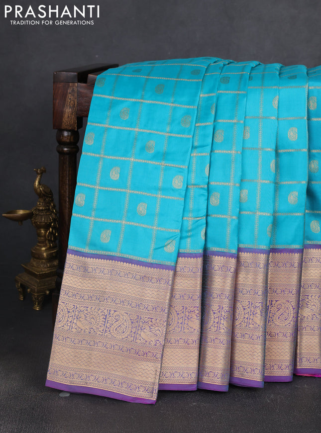 Kanchipuram silk saree cs blue and purple with allover zari checks & buttas and long zari woven border