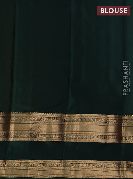 Kanchipuram silk saree rust shade and bottle green with allover zari woven buttas and long rettapet zari woven border