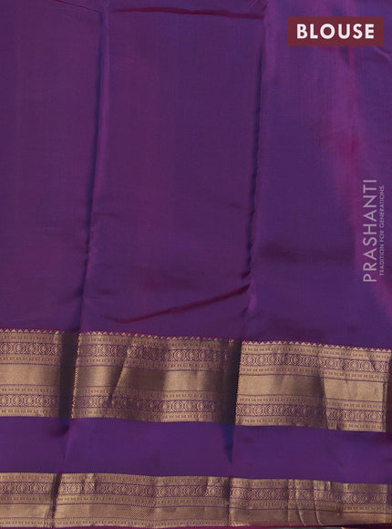 Kanchipuram silk saree teal green and pink with allover zari woven buttas and long rettapet zari woven border