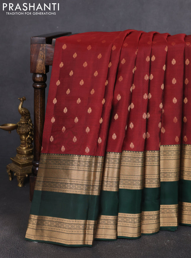 Kanchipuram silk saree deep maroon and bottle green with allover zari woven buttas and long rettapet zari woven border