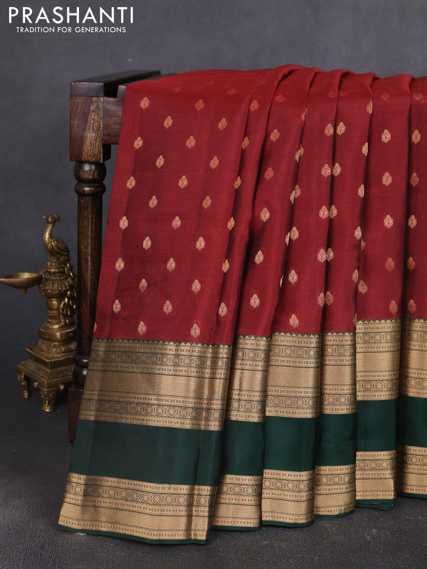 Kanchipuram silk saree deep maroon and bottle green with allover zari woven buttas and long rettapet zari woven border