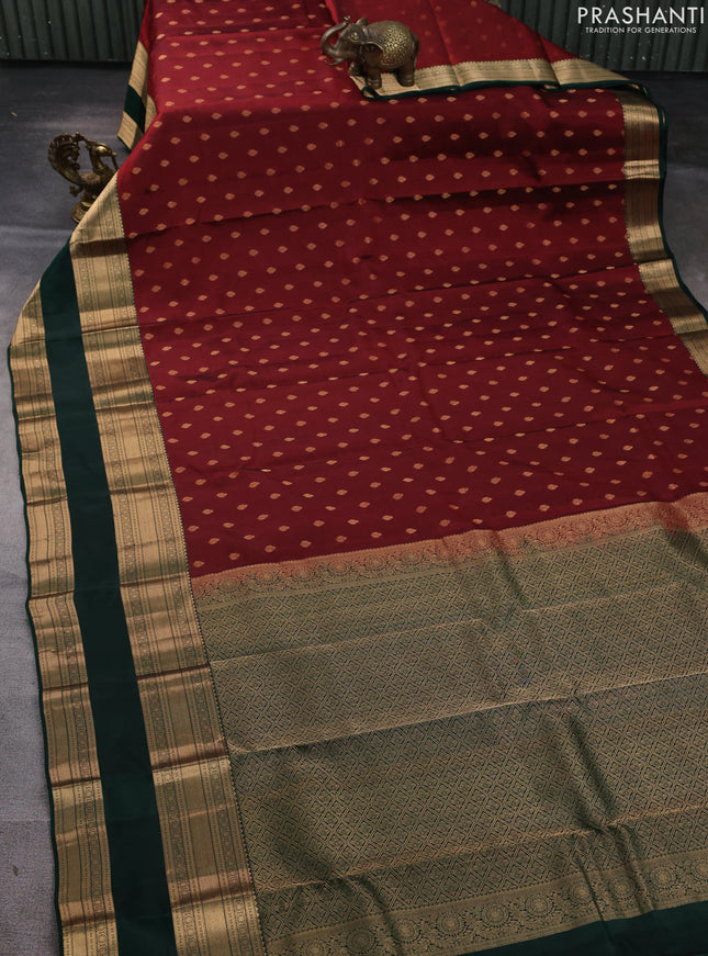 Kanchipuram silk saree deep maroon and bottle green with allover zari woven buttas and long rettapet zari woven border