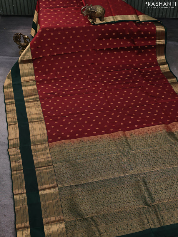 Kanchipuram silk saree deep maroon and bottle green with allover zari woven buttas and long rettapet zari woven border
