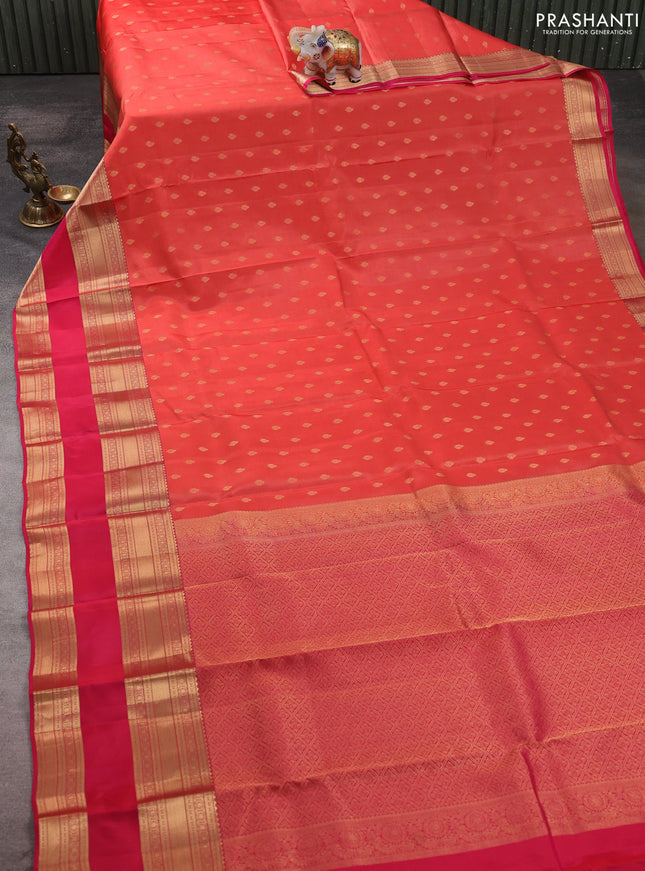 Kanchipuram silk saree orange and pink with allover zari woven buttas and long rettapet zari woven border