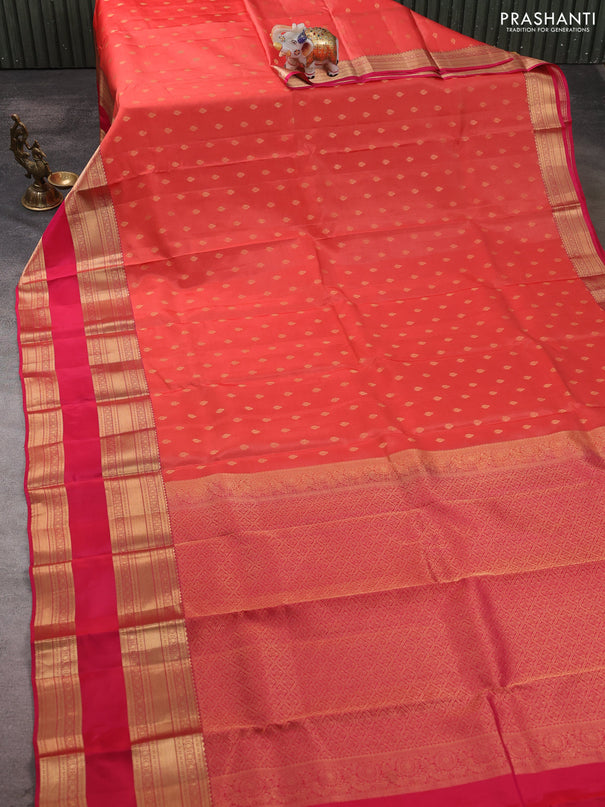 Kanchipuram silk saree orange and pink with allover zari woven buttas and long rettapet zari woven border