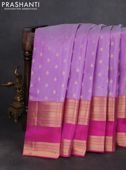 Kanchipuram silk saree lavender and pink with allover zari woven buttas and long rettapet zari woven border