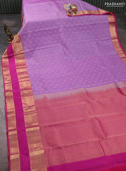 Kanchipuram silk saree lavender and pink with allover zari woven buttas and long rettapet zari woven border