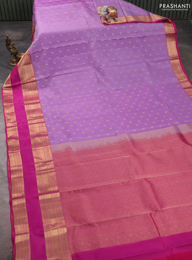 Kanchipuram silk saree lavender and pink with allover zari woven buttas and long rettapet zari woven border