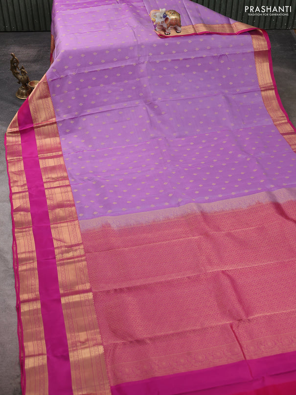 Kanchipuram silk saree lavender and pink with allover zari woven buttas and long rettapet zari woven border