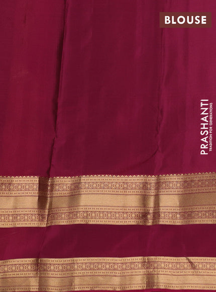 Kanchipuram silk saree pastel maroon and wine shade with allover zari woven buttas and long rettapet zari woven border